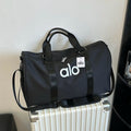 Bolso Deportivo de Viaje Alo Yoga Negro